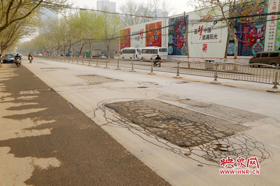 布滿(mǎn)了大小補(bǔ)丁的南陽(yáng)路