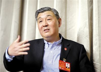 今年全國兩會期間，全國人大代表、浙江高院院長齊奇接受記者采訪。新京報記者 陳杰 攝