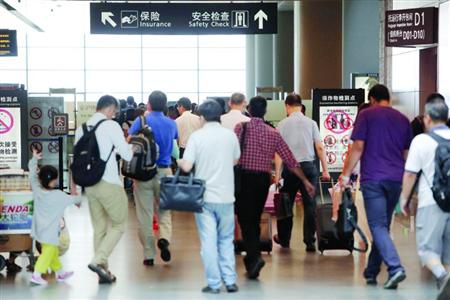 近期乘飛機應(yīng)留足更多的時間以免誤機。/晨報記者 殷立勤