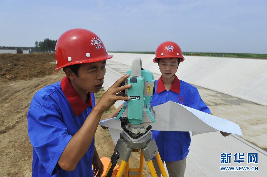 南水北調(diào)工地上的“平凡夫妻” 南水北調(diào)工地上的“平凡夫妻”