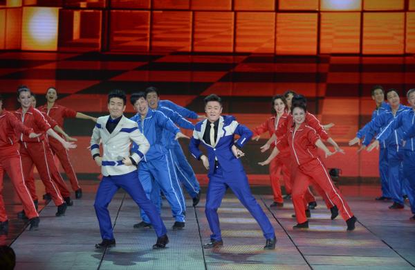 《小蘋果》、《最炫民族風(fēng)》等廣場舞曲將會有全國統(tǒng)一、編排科學(xué)、帶給人正能量的全新動作。 CFP 資料